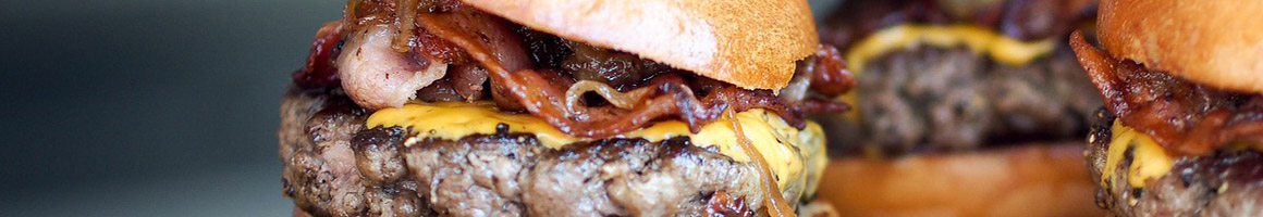 Eating American (Traditional) Burger at The Slip restaurant in Kirkland, WA.